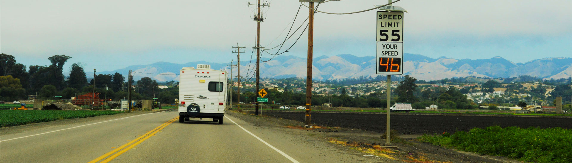 RV driving on road with RV Insurance in San Luis Obispo County, CA