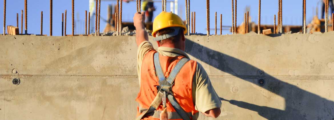 contractor working at construction site with Contractors Insurance in San Luis Obispo County, CA